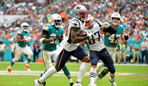 Dec 9, 2018; Miami Gardens, FL, USA; New England Patriots wide receiver Josh Gordon (10) carries the ball against the Miami Dolphins during the second half at Hard Rock Stadium. Photo Credit: Jasen Vinlove-USA TODAY Sports