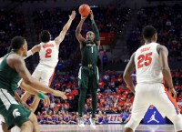 Michigan St. holds off Florida behind Langford, Ahrens