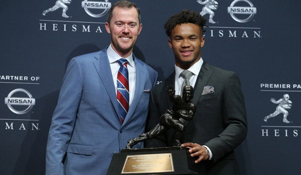 Dec 8, 2018; New York, NY, USA; Oklahoma Sooners quarterback Kyler Murray (right) poses for photos with head coach Lincoln Riley (left) during a press conference at the New York Marriott Marquis after winning the Heisman Trophy. Mandatory Credit: Brad Penner-USA TODAY Sports