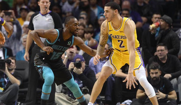 Dec 15, 2018; Charlotte, NC, USA; Los Angeles Lakers guard Lonzo Ball (2) is defended by Charlotte Hornets guard Kemba Walker (15) during the second half at the Spectrum Center. Lakers won 128-100.  Photo Credit: Sam Sharpe-USA TODAY Sports