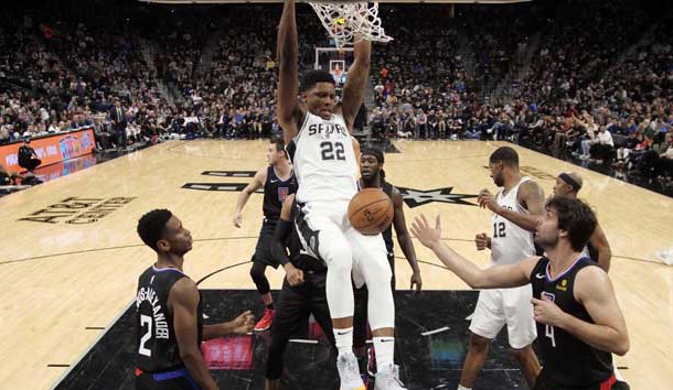 Dec 13, 2018; San Antonio, TX, USA; San Antonio Spurs small forward Rudy Gay (22) dunks the ball past LA Clippers point guard Shai Gilgeous-Alexander (2) during the first half at AT&T Center. Photo Credit: Soobum Im-USA TODAY Sports
