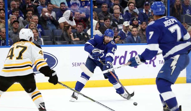 Dec 6, 2018; Tampa, FL, USA; Tampa Bay Lightning left wing Alex Killorn (17) passes the puck to Tampa Bay Lightning right wing Mathieu Joseph (7) to score a gaol against the Boston Bruins during the third  period at Amalie Arena. Photo Credit: Kim Klement-USA TODAY Sports