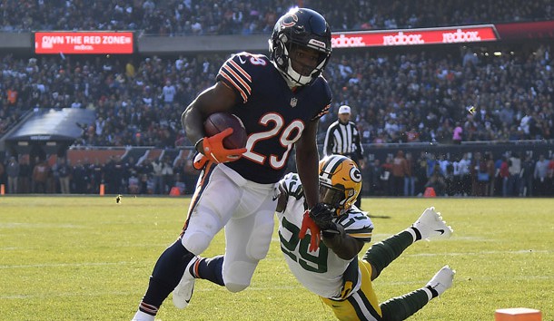 Dec 16, 2018; Chicago, IL, USA; Chicago Bears running back Tarik Cohen (29) breaks the tackle of Green Bay Packers strong safety Kentrell Brice (29) to score a touchdown at Soldier Field. Photo Credit: Quinn Harris-USA TODAY Sports