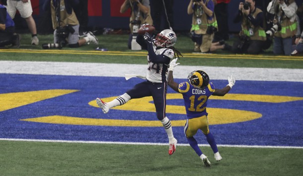 Feb 3, 2019; Atlanta, GA, USA; New England Patriots cornerback Stephon Gilmore (24) intercepts a pass indented for Los Angeles Rams wide receiver Brandin Cooks (12) in Super Bowl LIII at Mercedes-Benz Stadium.  Photo Credit: Kevin Jairaj-USA TODAY Sports