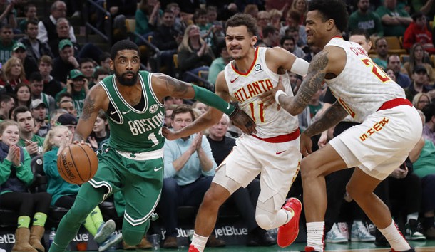 Mar 16, 2019; Boston, MA, USA; Boston Celtics guard Kyrie Irving (11) drives past Atlanta Hawks guard Trae Young (11) during the second half at TD Garden. Photo Credit: Winslow Townson-USA TODAY Sports