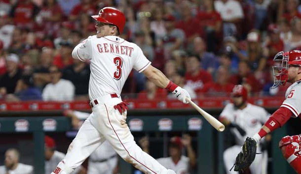 Jul 28, 2018; Cincinnati, OH, USA; Cincinnati Reds second baseman Scooter Gennett (3) hits an RBI double against the Philadelphia Phillies during the eighth inning at Great American Ball Park. Photo Credit: David Kohl-USA TODAY Sports