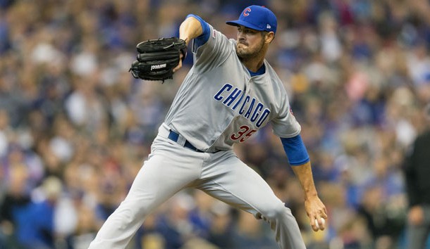 Apr 6, 2019; Milwaukee, WI, USA; Chicago Cubs pitcher Cole Hamels (35) throws a pitch against the Milwaukee Brewers during the first inning at Miller Park. Photo Credit: Jeff Hanisch-USA TODAY Sports