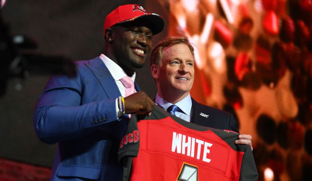 Apr 25, 2019; Nashville, TN, USA; Devin White (Louisiana State) stands with NFL commissioner Roger Goodell after he was selected as the number five overall pick to the Tampa Bay Buccaneers in the first round of the 2019 NFL Draft in Downtown Nashville. Photo Credit: Christopher Hanewinckel-USA TODAY Sports