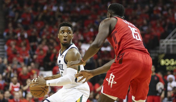 Apr 14, 2019; Houston, TX, USA; Utah Jazz guard Donovan Mitchell (45) dribbles the ball against Houston Rockets center Clint Capela (15) during the third quarter in game one of the first round of the 2019 NBA Playoffs at Toyota Center. Photo Credit: Troy Taormina-USA TODAY Sports