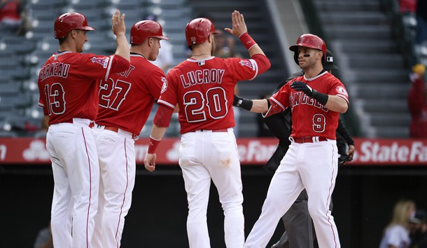 May 23, 2019; Anaheim, CA, USA; Los Angeles Angels third baseman Tommy La Stella (9) celebrates after hitting a grand slam during the ninth inning against the Minnesota Twins at Angel Stadium of Anaheim. Photo Credit: Kelvin Kuo-USA TODAY Sports