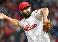 Arrieta exercises $20M option to stay with Phillies