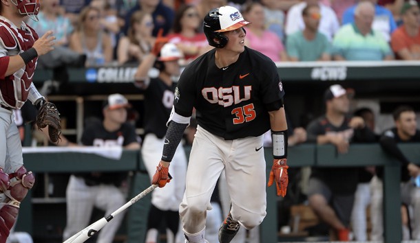 Jun 26, 2018; Omaha, NE, USA; Oregon State Beavers catcher Adley Rutschman (35) singles in the fourth inning against the Arkansas Razorbacks in game one of the championship series of the College World Series at TD Ameritrade Park. Photo Credit: Steven Branscombe-USA TODAY Sports