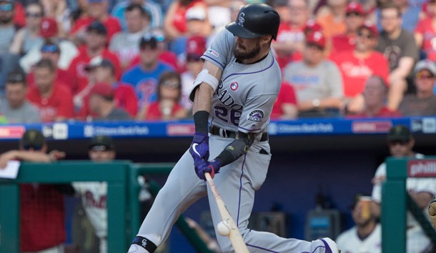 May 18, 2019; Philadelphia, PA, USA; Colorado Rockies left fielder David Dahl (26) hits a single during the seventh inning against the Philadelphia Phillies at Citizens Bank Park. Photo Credit: Bill Streicher-USA TODAY Sports