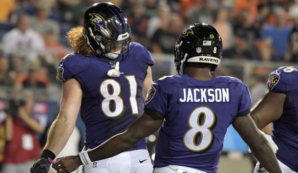 Aug 2, 2018; Canton, OH, USA;  Baltimore Ravens tight end Hayden Hurst (81) and quarterback Lamar Jackson (8) celebrate after a touchdown in the third quarter against the Chicago Bears during the Hall of Fame Game at Tom Benson Hall of Fame Stadium. The Ravens defeated the Bears 17-16. Photo Credit: Kirby Lee-USA TODAY Sports