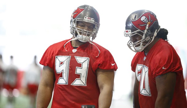 Jun 4, 2019; Tampa, FL, USA; Tampa Bay Buccaneers nose tackle Ndamukong Suh (93) and Tampa Bay Buccaneers defensive tackle Vita Vea (50) share a laugh as they work out at AdventHealth Training Center. Photo Credit: Kim Klement-USA TODAY Sports