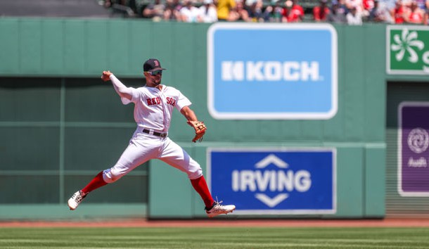 Jun 23, 2019; Boston, MA, USA; Boston Red Sox shortstop Xander Bogaerts (2) throws to first during the first inning against the Toronto Blue Jays at Fenway Park. Photo Credit: Paul Rutherford-USA TODAY Sports