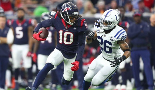 Jan 5, 2019; Houston, TX, USA; Houston Texans wide receiver DeAndre Hopkins (10) is chased by Indianapolis Colts strong safety Clayton Geathers (26)  in the second quarter in a AFC Wild Card playoff football game at NRG Stadium. Photo Credit: Mark J. Rebilas-USA TODAY Sports