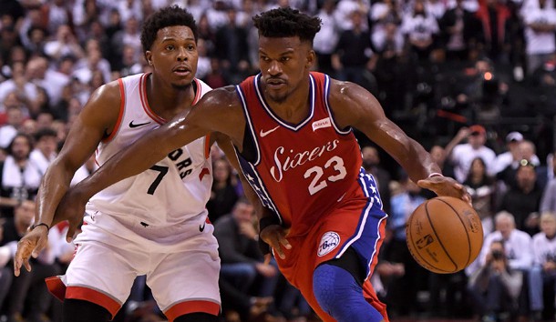 May 12, 2019; Toronto, Ontario, CAN;   Philadelphia 76ers guard Jimmy Butler (23) dribbles the ball against Toronto Raptors guard Kyle Lowry (7) in game seven of the second round of the 2019 NBA Playoffs at Scotiabank Arena. Photo Credit: Dan Hamilton-USA TODAY Sports