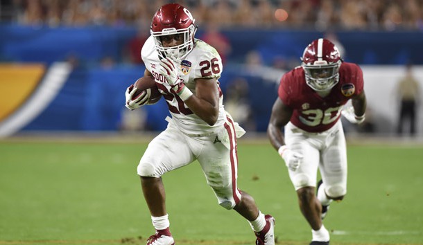 Dec 29, 2018; Miami Gardens, FL, USA; Oklahoma Sooners running back Kennedy Brooks (26) runs the ball against Alabama Crimson Tide linebacker Mack Wilson (30) during the third quarter of the 2018 Orange Bowl college football playoff semifinal game at Hard Rock Stadium. Photo Credit: John David Mercer-USA TODAY Sports