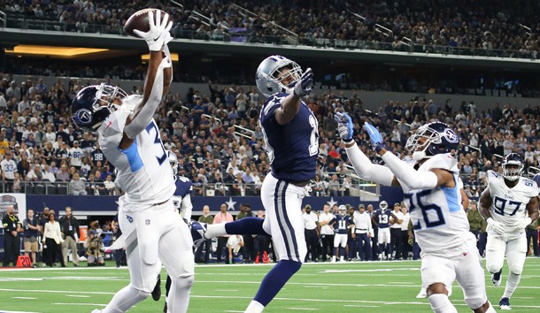 Nov 5, 2018; Arlington, TX, USA; Tennessee Titans safety Kevin Byard (31) intercepts the ball in the end zone intended for Dallas Cowboys receiver Amari Cooper (19) in the first quarter at AT&T Stadium. Photo Credit: Matthew Emmons-USA TODAY Sports