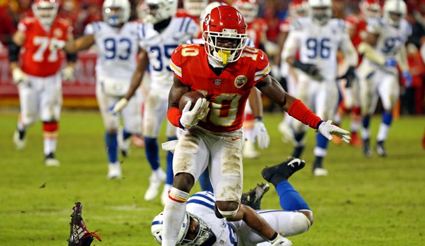 Jan 12, 2019; Kansas City, MO, USA; Kansas City Chiefs wide receiver Tyreek Hill (10) looses his shoe while running the ball against Indianapolis Colts linebacker Skai Moore (55) during the third quarter in an AFC Divisional playoff football game at Arrowhead Stadium. Photo Credit: Jay Biggerstaff-USA TODAY Sports