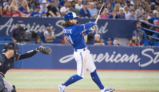 Aug 8, 2019; Toronto, Ontario, CAN;Toronto Blue Jays shortstop Bo Bichette (11) hits an RBI double during the sixth inning against the New York Yankees at Rogers Centre. Photo Credit: Nick Turchiaro-USA TODAY Sports