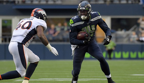 Aug 8, 2019; Seattle, WA, USA; Seattle Seahawks wide receiver D.K. Metcalf (14) runs the ball against Denver Broncos linebacker Keishawn Bierria (40) in the first half at CenturyLink Field. Photo Credit: Kirby Lee-USA TODAY Sports