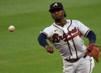 Braves' Ozzie Albies fouls ball off knee, leaves game